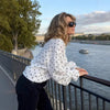 Camicia casual a pois ampia con bottoni frontali per un look elegante da inizio autunno