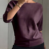 T-shirt in maglia da donna elegante e alla moda con maniche a tre quarti e scollo a barca
