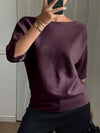 T-shirt in maglia da donna elegante e alla moda con maniche a tre quarti e scollo a barca