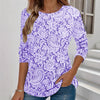Elegante maglia a maniche lunghe con scollo rotondo e stampa chic