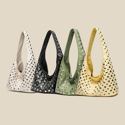 Borsa da donna alla moda con rivetti a pois