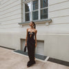 Vestito da festa aderente con spalle scoperte, schiena nuda e scollo a V profondissimo tipo bandeau