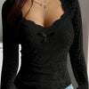 Top in pizzo romantico a maniche lunghe con fiocco