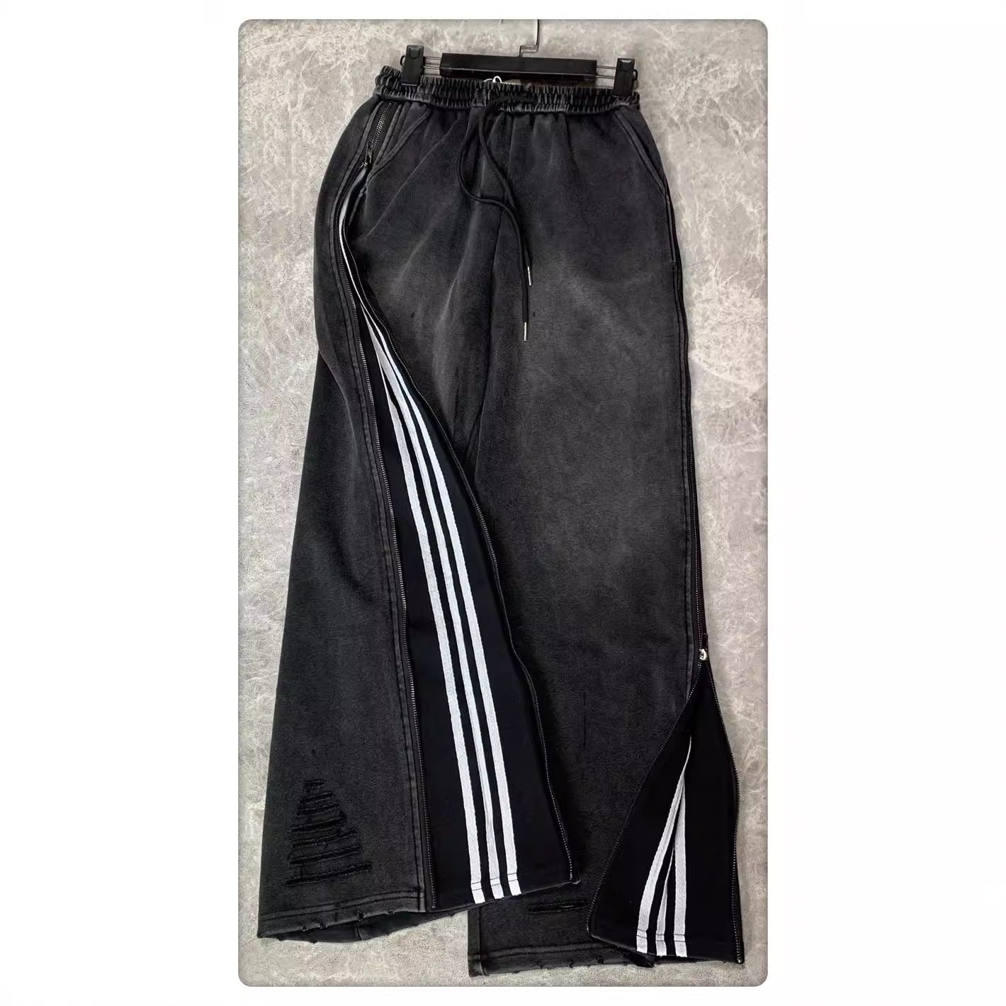 Pantaloni larghi a gamba larga con cerniera laterale bidirezionale e tre barre Design Sense