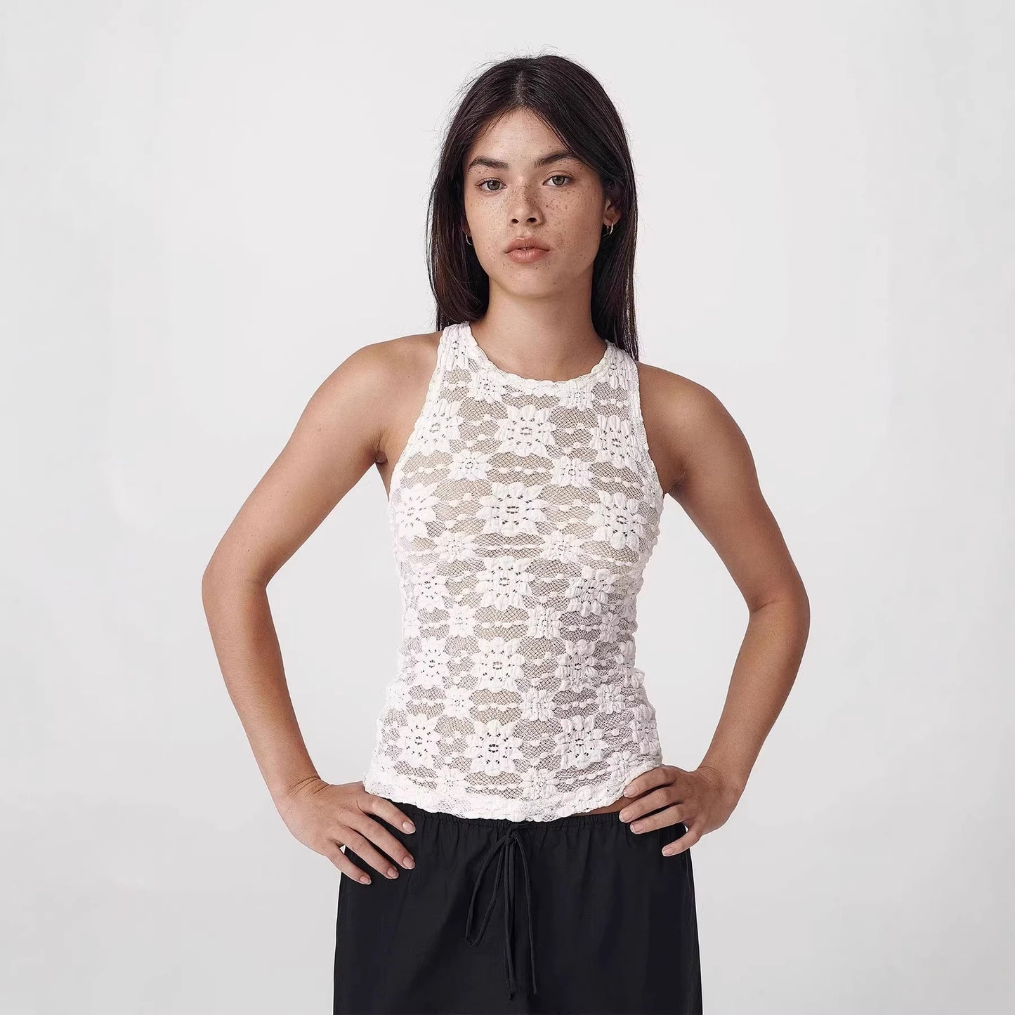 Top da donna attillato, sexy, traforato e alla moda