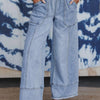 Pantaloni in denim a gamba larga con coulisse e cuciture a vista Beau Blue