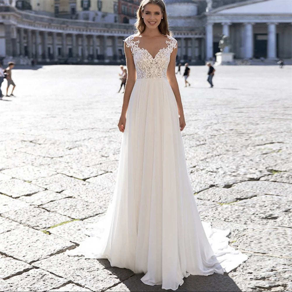 Un abito da sposa in chiffon della serie A con scollo a V e maniche lunghe