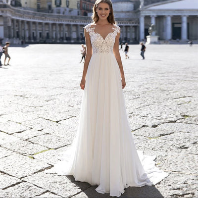 Un abito da sposa in chiffon della serie A con scollo a V e maniche lunghe
