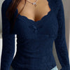 Top in pizzo romantico a maniche lunghe con fiocco