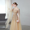 Vestito da Sera Lungo Elegante Maniche Svolazzanti Oro