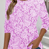 Elegante maglia a maniche lunghe con scollo rotondo e stampa chic