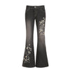 Pantaloni casual in denim con ricamo floreale