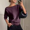 T-shirt in maglia da donna elegante e alla moda con maniche a tre quarti e scollo a barca