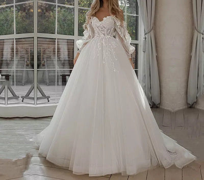 Abito da sposa Boho Abito da sposa con maniche a sbuffo e spalle scoperte